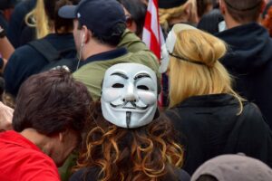 woman, protester, mask-2712315.jpg